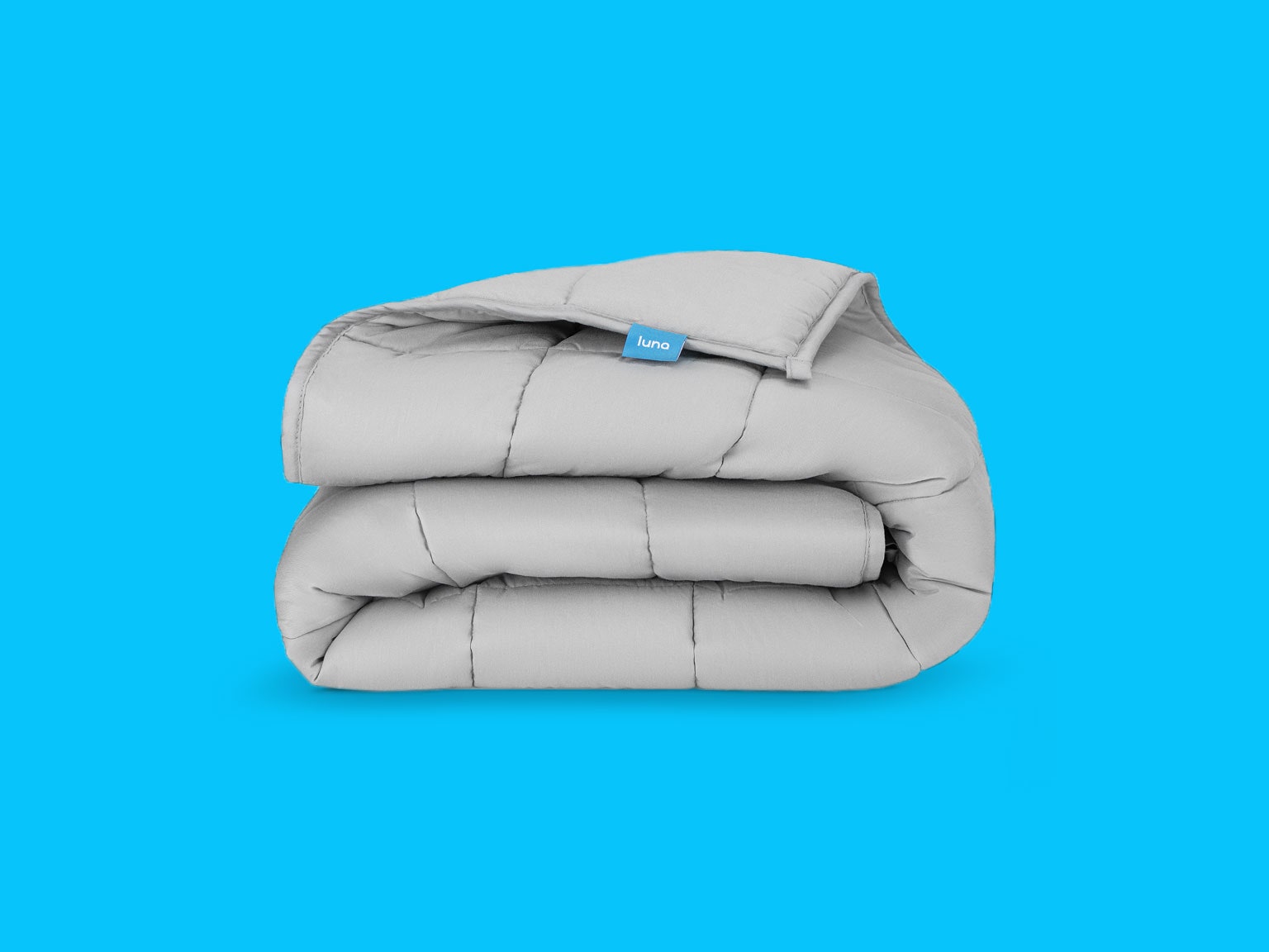 Luna weighted blanket on blue background