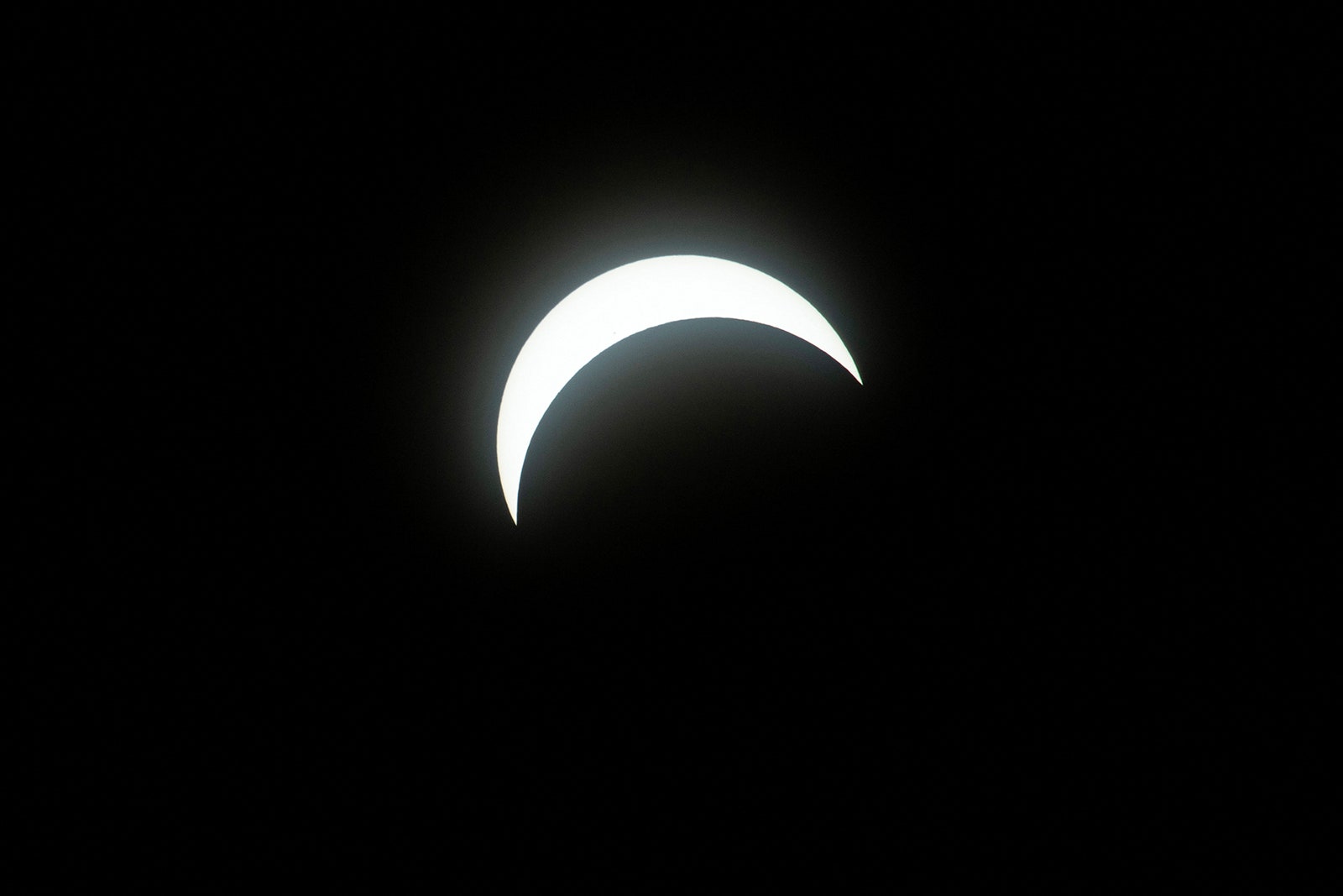 Photo of the moon eclipses the sun during a total solar eclipse across North America in Stowe Vermont