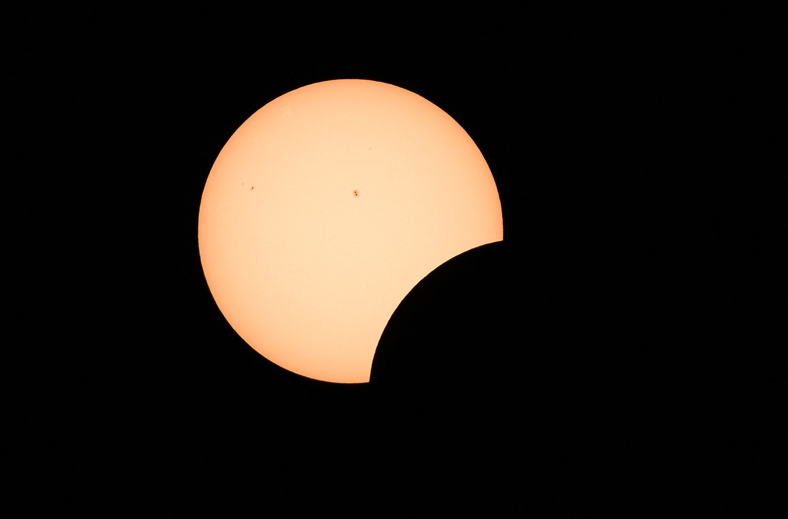 Photo of Early stages of a total solar eclipse in Bloomington Indiana