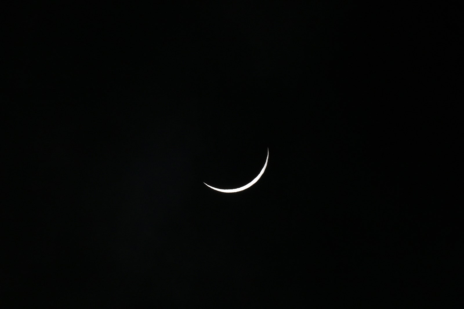 Photo of The moon eclipses the sun during a total solar eclipse across North America at Niagara Falls State Park in...